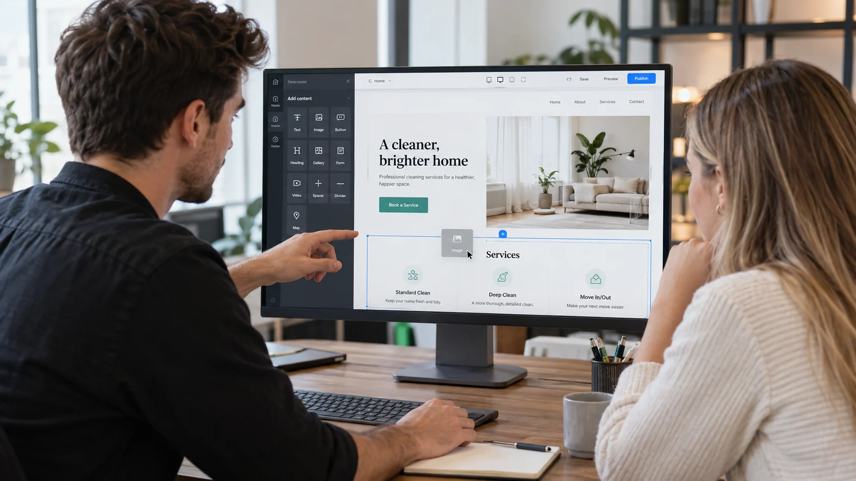 Marketing Account Manager and client reviewing a block-based website builder together